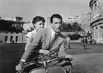 Audrey Hepburn and Gregory Peck in a still from Roman Holiday. 