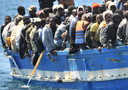 L'arrivo di un barcone di migranti