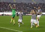 I giocatori della Juventus salutano i loro tifosi dopo aver ottenuto l'undicesima vittoria consecutiva nella partita del campionato di serie A contro il Cagliari allo stadio Sant'Elia, 12 Gennaio 2014