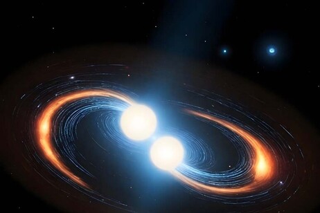Representación artística de dos estrellas de neutrones próximas a la colisión que las transformará en kilonovas (fuente: Clara &amp;amp; Sofía López Martín/Freepik, Alberto J. Castro-Tirado/IAA-CSIC/UMA)